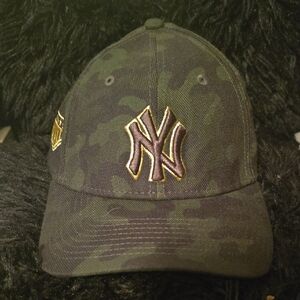 Stylish Black Camo Cap with Gold Emblem